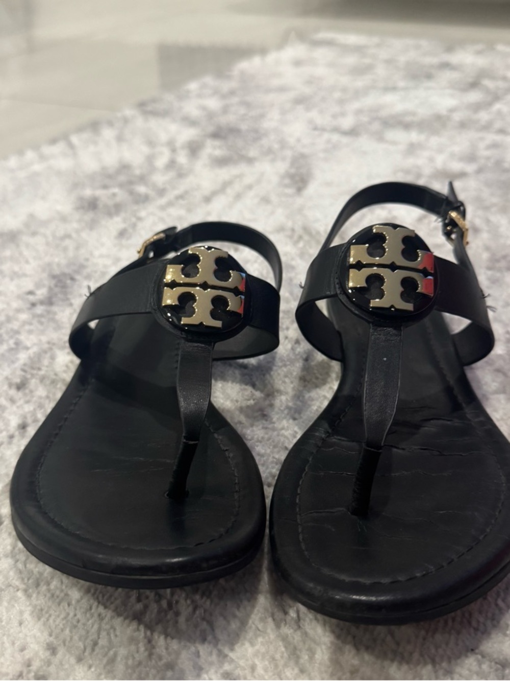 Tory Burch Black Leather Logo Thong Sandals with Gold Emblem